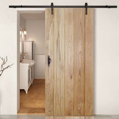 Thruslide Traditional Solid Rustic Oak Button Bead Ledged Sliding Door - Lifestyle Image. #barn #style #door Oak Sliding Doors Internal, Barn Doors Internal, Sliding Oak Doors Internal, Interior Wooden Barn Doors, Rustic Sliding Doors Interior, Traditional Sliding Door, Wooden Door Sliding, Barn Door For Kitchen, Oak Sliding Door