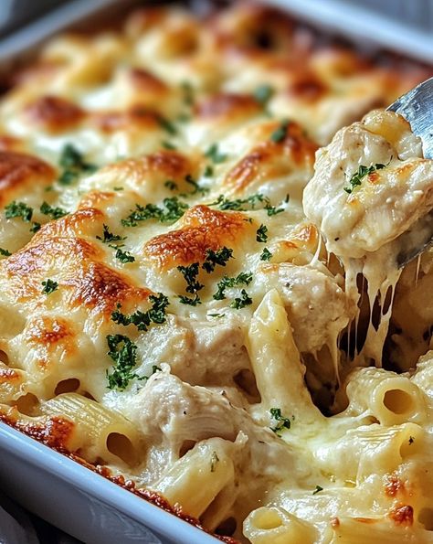 This Garlic Parmesan Chicken Pasta Bake is the perfect combination of creamy, cheesy goodness and savory garlic flavor. With tender pasta, juicy chicken, and a rich Parmesan sauce, this dish is sure to become a family favorite. Topped with melted mozzarella and baked to golden perfection, it's an easy and comforting meal that will please everyone at the table. Preparation Time: Prep Time: 15 minutes Cook Time: 25 minutes Total Time: 40 minutes Ingredients: 2 cups cooked pasta (penne or rotini) 2 Negresco Pasta Chicken, Baked Pasta Recipes Chicken, Garlic Parmesan Chicken Pasta Bake, Chicken Rotini Recipes, Baked Chicken Pasta, Penne Pasta Bake, Baked Chicken Pasta Recipes, Garlic Parmesan Chicken Pasta, Parmesan Chicken Pasta