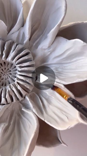 Mila Ilingina on Instagram: "Making wall sculpture inspired by sunflowers 🌻   #clayart #clayartist #clayartwork #art #artist #sculpture #sculpting #flower #flowerart #wall #wallart #walldecor" Sunflower Leaf, Clay Sunflower, How To Make Sunflower, Artist Sculpture, Sunflower Leaves, Air Dry Clay Projects, Clay Wall Art, Wax Carving, Relief Sculpture