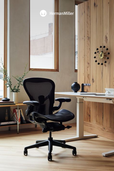 a black office chair sitting in front of a desk Noguchi Table, Eames House Bird, Aeron Chair, Eames House, Lounge Chair Design, Metal Dining Chairs, Ergonomic Office Chair, Herman Miller, Apartment Inspiration