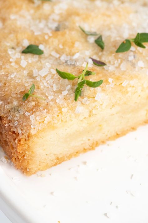 This Lemon Thyme Shortbread is not only ridiculously easy to make, it's also melt-in-your-mouth delicious and ALWAYS brings rave reviews! #lemonshortbread, #lemonthymeshortbread, #easylemonshortbread, #easyshortbreadcookies Lemon Thyme Dessert, Lemon Thyme Bars, Lemon Rosemary Shortbread, Lemon Thyme Shortbread Cookies, Lemon Thyme Cookies, Thyme Dessert, Lemon Thyme Cake, Lemon Shortbread Bars, Lemon Thyme Recipes