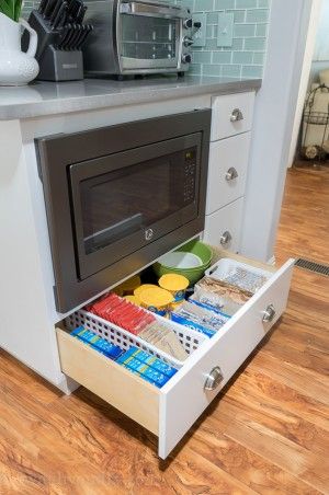 Under counter microwave, perfect for kid's use, with a drawer stashed full of snacks for the kids! Snacks Drawer, Mount Microwave, Microwave Foods, Counter Microwave, Under Counter Microwave, Microwave Cabinet, Clever Kitchen Storage, Microwave Drawer, Microwave In Kitchen