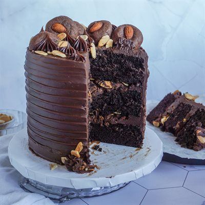 Mocha Almond Fudge Cake Almond Cake Filling, Baking Instagram, Almond Fudge, Lorann Oils, Chocolate Almond Cake, Almond Desserts, Chocolate Almond Butter, Cocoa Cake, Dark Chocolate Cake