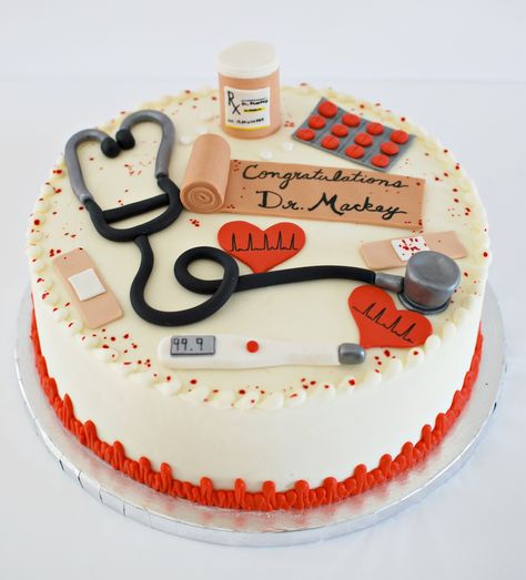 A medical cake for a nurse who earned her PhD Medical Doctor Cake Design, Doctor Cake Design, Doctor Theme Cake, Doctor Birthday Cake, Doctor Graduation Cake, Nursing Graduation Cakes, Medical Cake, Doctor Cake, Nursing Cake