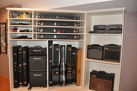 guitar case storage. Save Learn more at users.wowway.com Instrument Storage Ideas, Guitar Storage Cabinet, Guitar Furniture, Guitar Case Storage, Music Room Storage, Musician Life, Music Room Office, Instrument Storage, Music Furniture