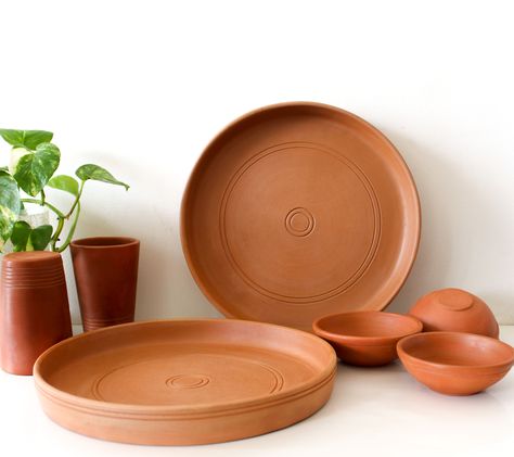 Serve your meal with a dose of tradition. Crafted by the artisans to make every meal an experience.
Gift your loved ones a healthier lifestyle with this beautiful Thali Set Kerala Style Thali Designs, Terracotta Plates, Terracotta Dishes, Terracotta Dinnerware, Terracota Plates, Mexican Clay Dinnerware, Unique Kitchen Items, Wood Kitchen Tool, Ceramic Cutlery