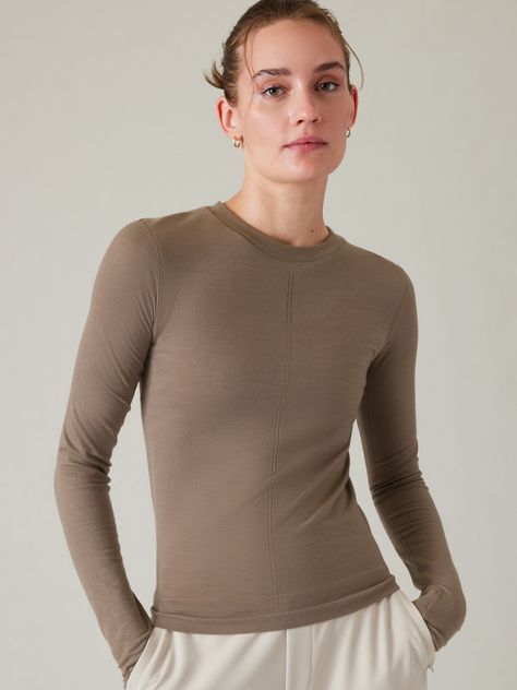 FOR: Commute, travel, hiking in cold weather climates FEEL: New and improved Merino Wool yarn is ultra-soft and lightweight FAVE: Pointelle stitching down the front for breathability Close-to-body fit make it the perfect base layer Light mesh structure on back facilitates ventilation Fitted next to the body Regular length, hits at low hip Crew neck Body length in size medium: Regular: 23". High Top Adidas, Seamless Top, Bra Dress, Weather And Climate, Merino Wool Yarn, Travel Hiking, New And Improved, Free Fabric, Base Layer