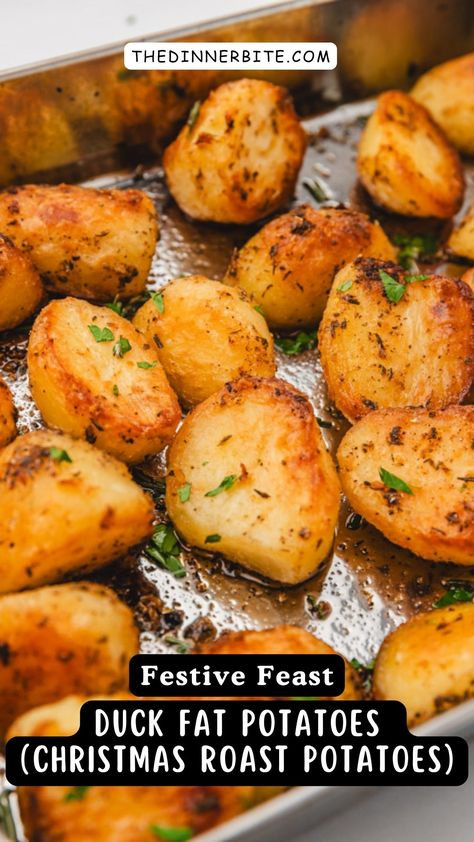 Indulge in the ultimate holiday side dish with our mouthwatering Duck Fat Potatoes (Christmas Roast Potatoes) recipe! Made with high-quality duck fat, these potatoes are crispy on the outside and tender on the inside. A true crowd-pleaser, they'll have everyone coming back for seconds. Discover the secret to making your Christmas dinner unforgettable with The Dinner Bite. Christmas Eve Dinner Potatoes, Duck Fat Roast Potatoes, Potatoes Christmas Dinner, Crispy Duck Fat Potatoes, Christmas Roasted Potatoes, British Baked Potatoes, Christmas Lunch Sides Ideas, Christmas Breakfast Potatoes, Sides For Duck Dinner