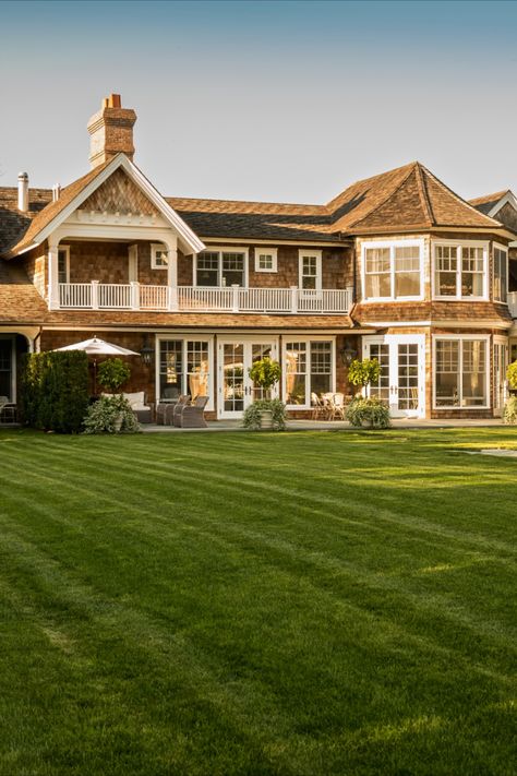 Beautiful shingle style home during Magic Hour #FleetwoodMcMullan #ShingleStyle #Hamptons #Hamptonsliving #decor #outdoorliving #patio #architecture #architecturephotography #gambrelroof #hamptonsstyle #easthampton #MagicHour #GoldenHour Hamptons Backyard, Hamptons Style Decor, House In The Hamptons, Hampton Home, Shingle House, Gambrel Roof, Shingle Style Homes, Hamptons Style, Hamptons House