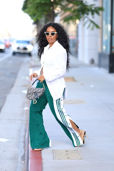 Adibreak Pants curated on LTK Green Sweat Suit Outfit, Smart Tracksuit Outfit, Track Pants And Heels Outfit, Blazer And Track Pants, Oversized Track Pants Outfit, Green Adidas Track Pants Outfit, Adidas Outfit Black Women, How To Style Adidas Pants, Sweatpants Outfit With Heels