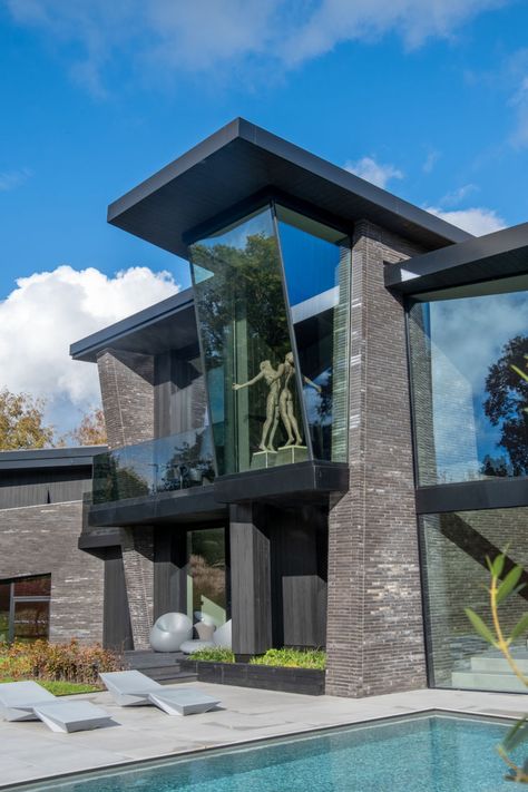 Structural glass to luxury dwelling leans at an angle forming a remarkable piece of architectural glazing Modern Glass House Architecture, Architecture Glass House, Glass Modern House, Glass Contemporary House, Two Story Glass House, Villain House, Concrete Glass House, Modern Glass House, Glass House Design