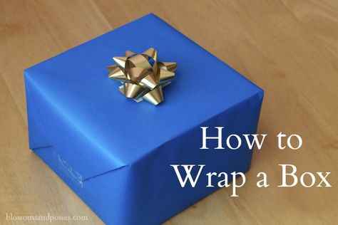 Rubbish at wrapping Christmas presents and boxes? Go back to square one (get it?) with this easy guide on how to wrap presents. How To Gift Wrap Square Boxes, Wrapping A Square Present, How To Wrap A Square Box Gift, How To Wrap Presents, Wrapping Christmas Presents, Mrs Brown, Gift Wrapping Tutorial, When She Says, Back To Square One