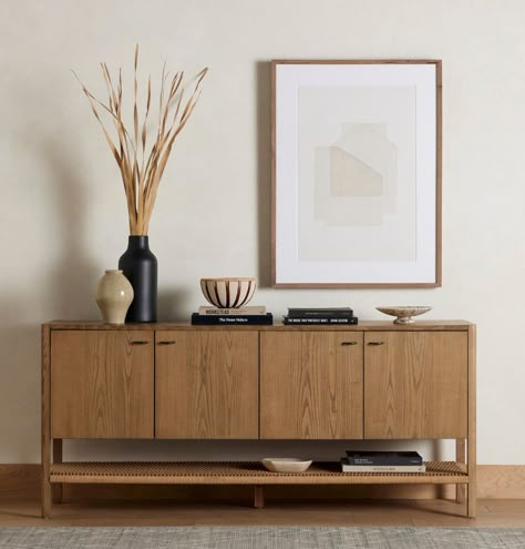 Simple yet refined, a Danish design-influenced sideboard is made from solid ash, with iron hardware finished in a sleek gunmetal. Stretcher-style shelving made from woven paper cord serves up a textural finishing touch. Color: Dune Ash Dimensions: 18"D x 72"W x 32"H Materials: Solid Ash,Iron,Rush Weight: 160.94 lb Modern Entertainment Center, Solid Wood Sideboard, Iron Hardware, Rustic Lodge, Wood Sideboard, Woven Paper, Sideboard Buffet, Ash Wood, Danish Design