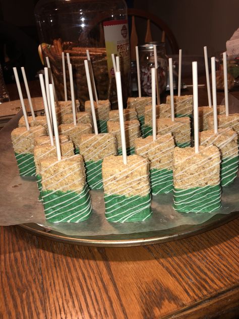 Green & white chocolate covered Rice Krispies treats Safari Treats Ideas, Rice Krispie Treats Safari Theme, Safari Themed Rice Krispy Treats, Rice Krispie Treats Dinosaur, Jungle Theme Rice Krispie Treats, Wild One Rice Crispy Treats, Dipped Rice Crispy Treats, Safari Dessert Ideas, Jungle Theme Sweet 16