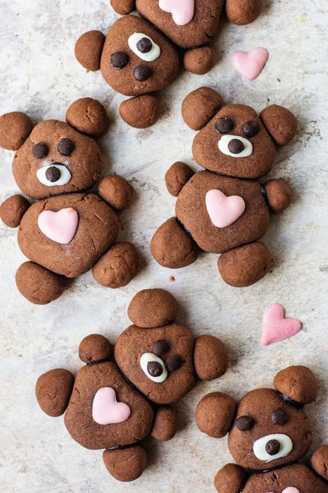 With all the sweetness surrounding February 14th, it's no wonder that Valentine's Day desserts are some of our favorites! Sweethearts, sweet desserts, sweet date ideas… it never stops. Over the past few days, I was brainstorming and then I came across these cute teddy bear cookies and it is something with which you can surprise your loved ones. These teddy bear cookies are made with four ingredients and trust me they are so easy and quick to make without any hustle. It is undoubtedly the perfect Chocolate Teddy Bear, Bake With Shivesh, World Chocolate Day, Teddy Bear Cookies, Valentines Baking, Teddy Bear Ornament, Comfort Desserts, Fudge Frosting, Melting White Chocolate