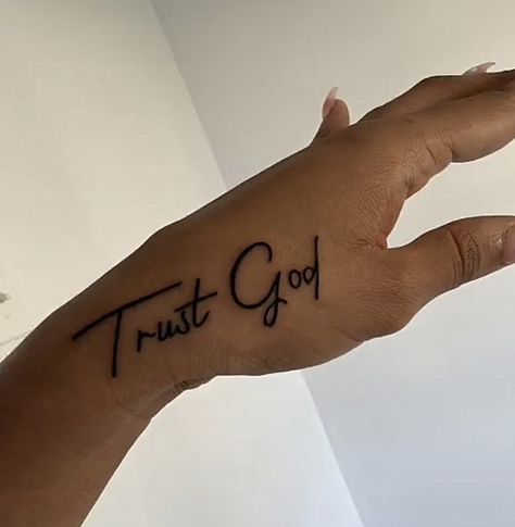 Trust God Hand Tattoo, But God Tattoos For Women, Trust God Tattoos For Women, Blessed Tattoo For Women, Worship Tattoo Ideas, Trust God Tattoo, Godly Tattoos For Women, Biblical Tattoos For Women Sleeve, Jesus Tattoo For Women