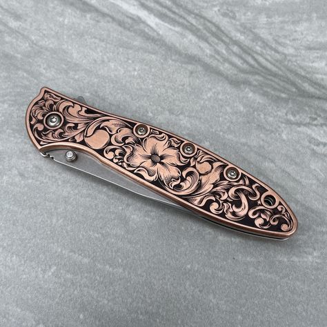 "Laser Engraved, hand finished and antiqued Kershaw Leek - Stainless Steel or Copper scales.  Made in the USA  Specs:  Handle Material: Copper/Stainless Length Open: 7.0\" (17.9 cm) Blade Length: 3.0\" (7.6 cm) Length Closed: 4.0\" (10.3 cm)   Please note that all VAT/customs fees for customers outside the U.S. are the responsibility of the customer." Knife Aesthetic, Engraved Knife, Pretty Knives, Dagger Knife, Cool Swords, Knife Collection, Cool Knives, Leeks, Cool Items