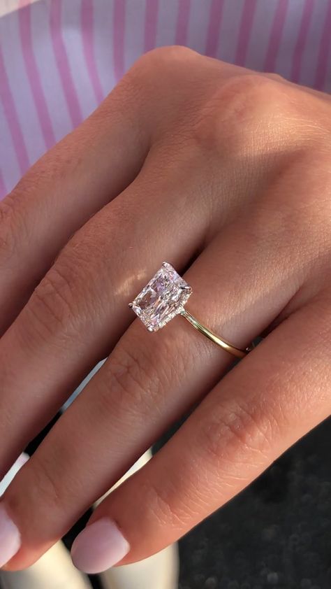 Radiant Minimize Hidden Halo Solitaire Ring - X3403 Check more at https://weddingideas.space/radiant-minimize-hidden-halo-solitaire-ring-x3403/ Rectangular Engagement Ring With Band, Radiant With Gold Band, Radiant Ring Settings, Classy Engagement Ring Gold Band, Solitary Engagement Rings Gold, What Ring Looks Best On My Hand, 3 Carat Radiant Diamond Ring, 6ct Radiant Engagement Ring, Solitaire Engagement Ring With Unique Band