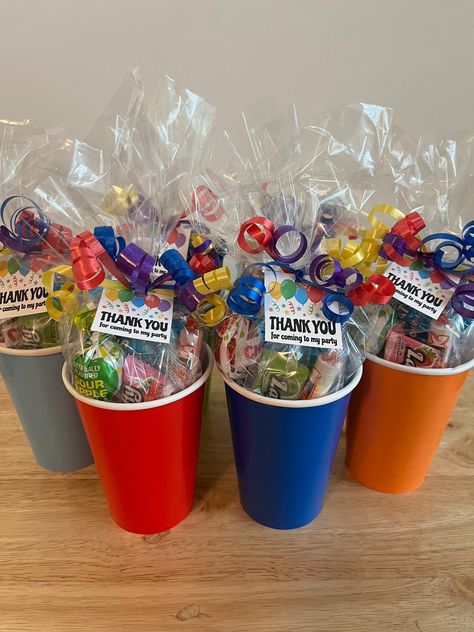 "Birthday Party Favor! Pre Filled! Each goodie bag will come in a variety of different colored non-reusable 12oz paper party cups Each favor comes with the following: 1 mini bag of pretzels or Rice Krispie treat 1 lollipop (flavor varies) 1 snack size package of cookies. (Type varies (Oreo, chips ahoy...) 2 additional pieces of candy (Smarties, Laffy Taffy, mini Swedish Fish, mini Sour Patch kids ...) All snacks are in original packaging. Orders will ship within 1-3 business days Please note: it Adult Party Favors Birthday Goodie Bags, Goodie Bag Ideas For Kids, Classroom Birthday Treats, Goodie Bag Ideas, Birthday Party Treats, Birthday Goodie Bags, Gift Bag Ideas, Party Favors For Kids, Candy Party Favors