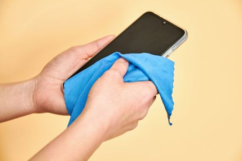 How to Clean Your Cell Phone—And How Often You Should Clean Iphone, Phone Etiquette, Clorox Wipes, Female Hands, Clean Phone, Hilarious Jokes, How Do You Clean, Iphone Hacks, Disease Prevention