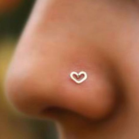 this is actually kind of cute. Heart Nose Piercing, Dream Piercings, Heart Nose Rings, Nose Piercing, Piercing Jewelry, Nostril Hoop Ring, Tattoos And Piercings, Cute Jewelry, Hair Ideas