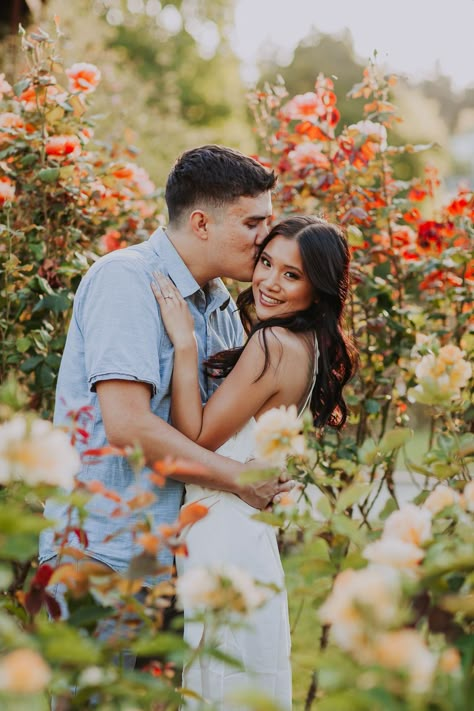 Rose Garden Couple Photography, Flower Garden Couple Photoshoot, Engagement Photos Flower Garden, Couple Photoshoot In Garden, June Engagement Photos, Engagement Garden Photos, Garden Couple Shoot, Rose Garden Photoshoot Ideas, Botanical Garden Photo Shoot Couple