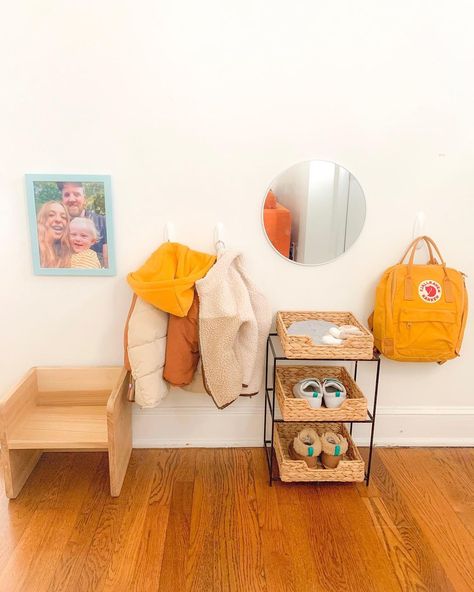 Sonny’s Montessori on Instagram: “Toddler entryway 🌨🧤⁣ Sonny’s entryway station has had a recent refresh. Here you will find:⁣ •Two coat options⁣ •Two shoe options⁣ •Hats⁣…” Toddler Coat And Shoe Area, Montessori Entrance Hall, Toddler Mirror Station, Montessori Shoe Station, Entryway Montessori, Toddler Getting Ready Station, Montessori Entrance, Montessori Hallway, Montessori Dressing Station