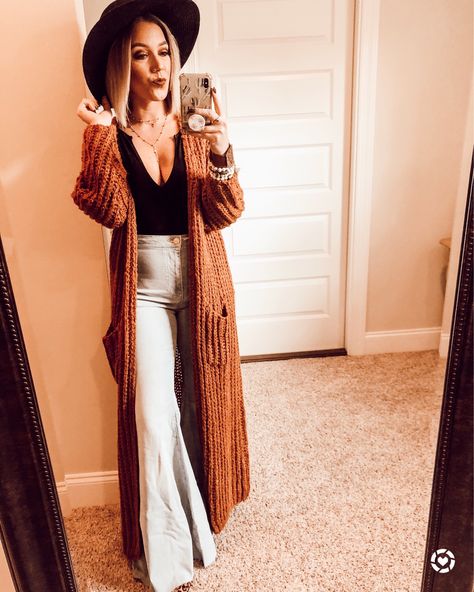 Boots And Bell Bottoms Outfit, Long Sleeve Shirt With Bell Bottoms, Sweater And Bell Bottom Jeans, Fall Duster Outfit, Fall Outfits Long Cardigan, Courdory Bell Bottoms Outfit, Winter Bell Bottoms Outfit, Bell Bottoms Outfit Fall, Fall Bell Bottoms Outfit