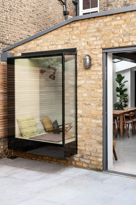 Contemporary oriel window comprising back painted structural glass and birch plywood lining. House extension in Camberwell, London by Rider Stirland Architects. Small Glass Extension, Camberwell London, Oriel Window, Window Seat Kitchen, Window Seat Design, House Extension Plans, Box Window, Roof Extension, Glass Extension