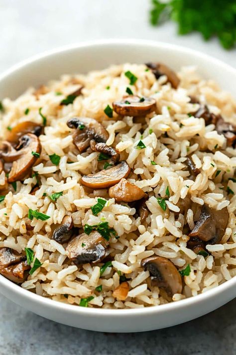 This one-pot mushroom rice is the perfect accompaniment to any table! Serve it with chicken, fish, beef, or even as a standalone meal. Baked Mushroom Rice, Sausage And Potatoes Skillet, Mushroom Rice Recipes, Baked Mushrooms, Salmon Patties Recipe, Fresh Tomato Recipes, Fluffy Rice, Mushroom Rice, Vegetarian Chicken