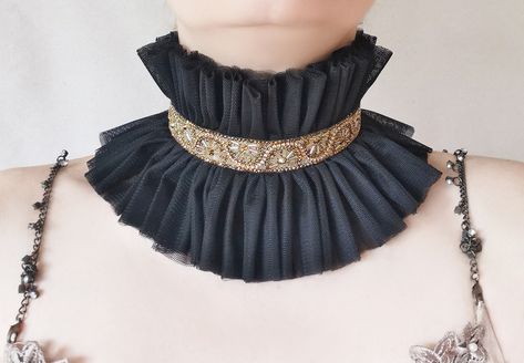 Rococo style hold trimming collar with ruffles for Photoshoot Model or Party, tulle beaded high choker in black with beautiful beaded trimming by Elyseeart. Unique stage costume high neck collar. ♥ Materials: hand sewn layered high quality soft tulle fabric, Rococo style beaded trimming in beautoful shades of antique gold-bronze. Adjustable on neck circle with tulle ties. Each ruffle is hand sewn. *non scratchy tulle, soft and friendly on skin for many hours. *non itchy tulle One size fits all. Queen Photoshoot, Costume Collar, Ruff Collar, Photoshoot Props, Stage Costume, Black Tulle, Rococo Style, Soft Tulle, Beaded Trim