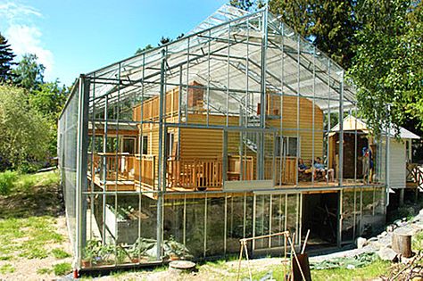 Having a greenhouse attached to my house is something I want, but never thought about enclosing my home in the greenhouse. Private Greenhouse, Greenhouse Living, Inspirational Architecture, Cheap Greenhouse, Dome Greenhouse, Best Greenhouse, Indoor Greenhouse, Home Greenhouse, Greenhouse Effect