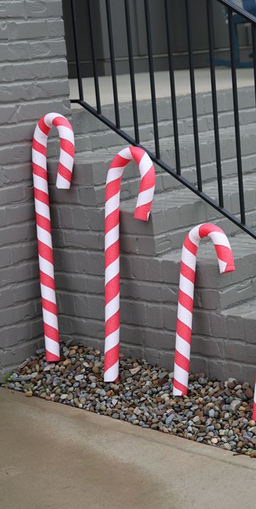 Pool Noodle Candy Cane Candy Canes Out Of Pool Noodles, Candy Cane Columns, Candy Cane Pool Noodle, Candy Cane Pool Noodle Diy Christmas, Pool Noodle Candy Cane Diy Christmas, Diy Candy Cane Decorations Outdoor, Diy Pool Noodle Christmas Decorations, Pool Noodles Christmas Decorations, Pool Noodle Candy Cane