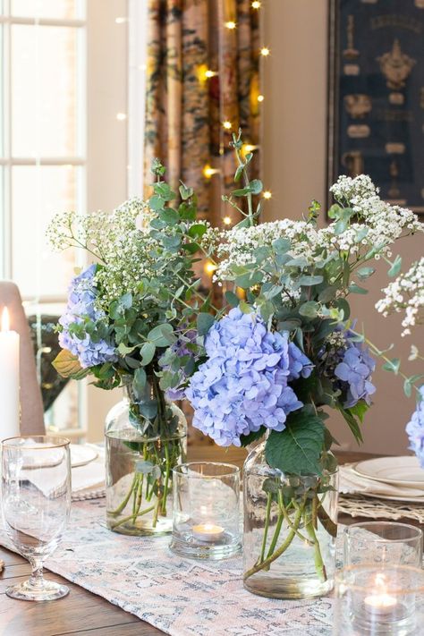 Blue Hydrangea Table Decor, Hydrangea And Roses Arrangements, Blue Table Arrangements, Small Hydrangea Centerpiece, Hydrangea Bouquet In Vase, Blue Flower Centerpieces, Wooded Backyard, Blue Flower Arrangements, Hydrangea Vase