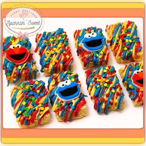 Sesame street rice krispie treats Birthday Party Candy Table, Sesame Chocolate, Party Candy Table, Sesame Street Birthday Party Ideas Boy, Elmo Birthday Party Boy, Sesame Street Birthday Cakes, Elmo First Birthday, Cookie Monster Birthday Party, Chocolate Rice Krispies