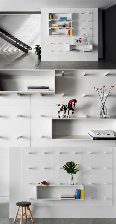 ARIS Architects has created a simple yet elegant modular shelving system- DOTS with interchangeable boxes for Italian furniture manufacturer Polarislife. This modular system can be mounted onto any wall within your living room, bedroom or kitchen, offering you ample customizable storage space with unique design.  #Bookshelf #bookcase #shelvingunit #shelf #storageideas Modular Wall System, Office Wall Shelves, Design Bookshelf, Modular Bookshelves, Communal Space, Shelf Designs, Modular Furniture System, Modular Shelving System, Cheap Patio Furniture