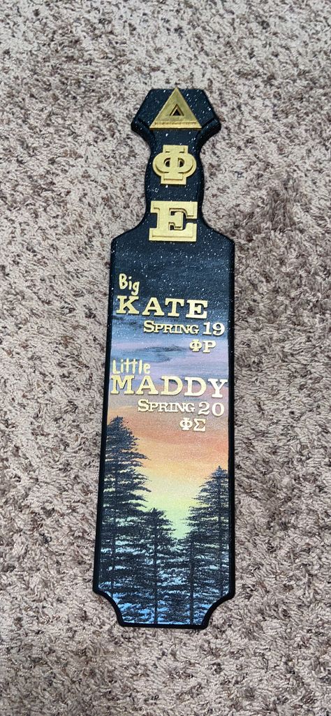 Greek Paddles Sorority Ideas, Sorority Paddles Mountains, Sorority Plaques, Cute Sorority Paddles, Greek Paddles Sorority, Frat Paddles, Alcohol Paddle Sorority, Beach Paddle Sorority, Resin Paddle Sorority