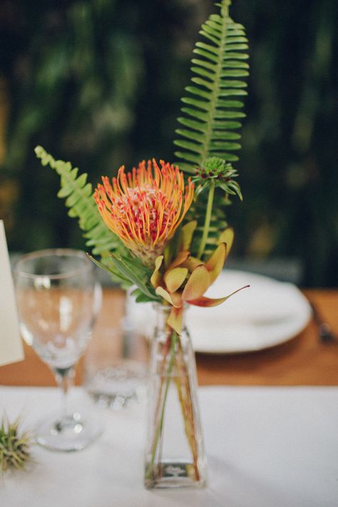 Tropical Bud Vase Centerpieces, Tropical Floral Centerpieces Simple, Minimal Tropical Centerpiece, Simple Tropical Sweetheart Table, Minimalist Tropical Flower Arrangement, Tropical Centerpieces Wedding Receptions, Tropical Fruit Wedding Decor, Tropical Flowers Table Decor, Tropical Flower Table Arrangements