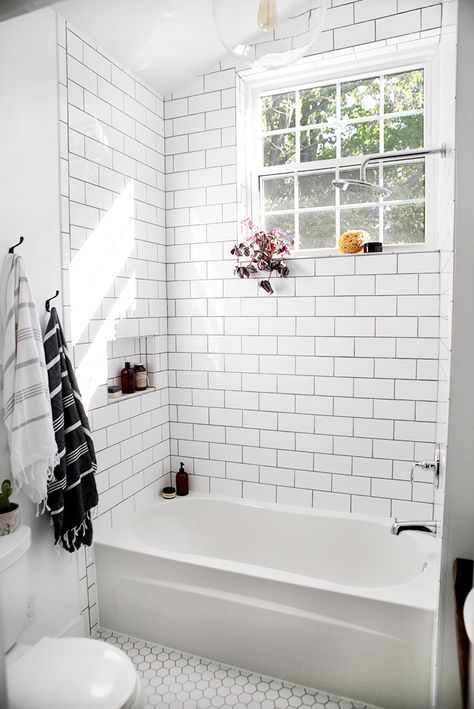 Bathroom Reveal @themerrythought Bathroom Tub Shower Combo, White Subway Tile Bathroom, Makeover Kamar Mandi, Tiled Bathroom, Subway Tiles Bathroom, Bathroom Tub Shower, White Bathroom Tiles, Bad Inspiration, Farmhouse Master