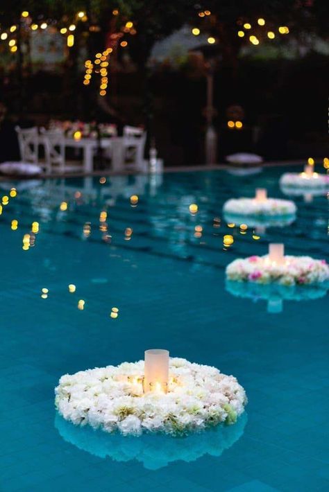 Light up the pool during your outdoor party and enjoy its magical vibe! Make floaters and use that to place candles and lanterns. Beautiful! Read our post for more lighting ideas for a cozy outdoor party! Backyard Wedding Pool, Wedding Pool Party Decorations, Pool Wedding Decorations, Pretty Pool, Wedding Pool Party, Pool Wedding, Outdoor Party Lighting, Outdoor Dinner Parties, Poolside Party