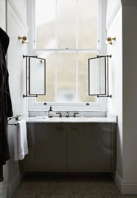 8 Bathrooms That Prove Why A Window Above A Vanity Is A Good Thing | The Savvy Heart | Interior Design, Décor, and DIY Bathroom Vanity With Window In Middle, Mirror Over Window Bathroom, Bathroom Sink In Front Of Window, Bathroom Sink Under Window, Bathroom Mirror Inspiration, Window Over Sink, Bathroom Mirror Design, Above Sink, Modern Bathroom Mirrors