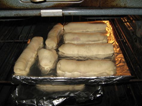 These are like the famous Pepperoni Rolls made by Double Daves Pizzaworks from College Station, TX, Home of Texas AAndM University.  I use to sit and watch the guys making them, while eating a bunch.  Best served with Ranch dressing, or Pizza sauce.  These Pepperoni Rolls dont need sauce inside to be really, really good.  I used to be able to eat about 9 of these for dinner in college.  I make them by the dozen, because my two kids eat a lot of them.  Watch out - These are addicting! Double Daves Pizza Rolls Recipe, Scrumdiddlyumptious Recipes, Homemade Pepperoni, Pepperoni Pizza Rolls, Pizza Roll Recipe, Pepperoni Rolls, Ny Pizza, Pizza Ideas, Pizza Roll