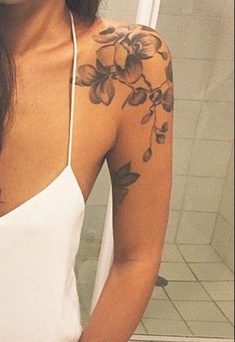 220+ Unparalleled Orchid Tattoo Designs With Meanings (2023) - TattoosBoyGirl Orchid Tattoo Shoulder For Women, Orchid Flower Tattoos Shoulder, Orchid Tattoo Back For Women, Shoulder Orchid Tattoo, Orchid Shoulder Tattoos For Women, Orchid Sleeve Tattoo, Orchid Arm Tattoo, Shoulder Tattoo Ideas Unique, Arm Shoulder Tattoos For Women