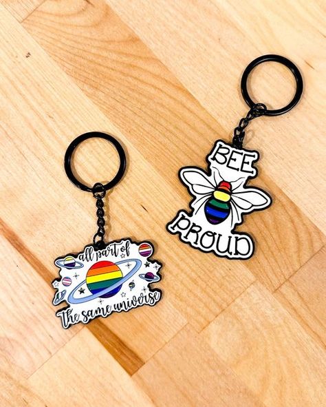 Rainbow Certified🌈💕 on Instagram: "Keychains but… make it gay🌈💅 - Like everything we do over here at #RainbowCertified, we like to add a sprinkle of pride to all of our accessories & apparel because that’s just who we are!🌈🙌 - P.S we have some very exciting new products coming very soon! 💕 - #keychain #keychains #keychainsofinstagram #instagood #instadaily #instagay #pride #pride365 #lgbtqia #lgbtq🌈 #makeitgay #key #keys #accessories #newproduct #newproducts #keyring #keyrings #keyringsofinstagr Keys Accessories, Bee Keychain, Enamel Keychain, New Sticker, Accessories Unique, Key Rings, New Products, Sprinkles, Keychains