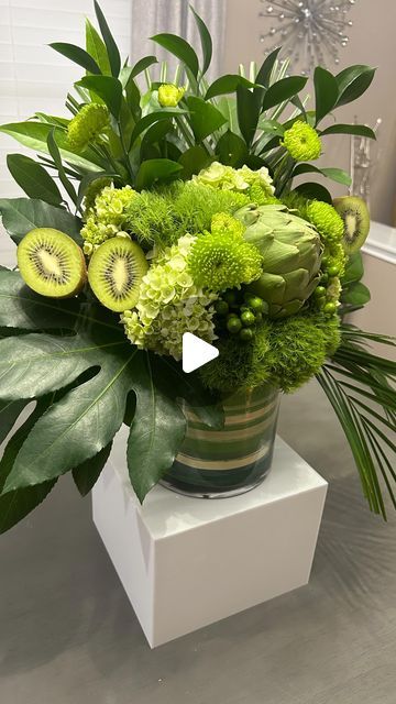 Angela McCurry on Instagram: "Go Green - Flower Arrangement  💚   I would like to share this flower arrangement with you; using all green tones and different textures makes this arrangement more calming.  🌿  I like thinking outside the box by adding fruits and or vegetables to the arrangements.  🥝   This would also make a perfect St Patrick’s day arrangement -  But remember……. 🍀 “Never iron a four - leaf clover, because you don’t want to press your luck.” 🤣😆  Follow @mccurryangela  💐for more flower arrangement ideas • • • • • • #flowers #gogreen #flowerarrangement #flowerarrangements #greenflowers #florist #flowerdesigner #green" Press Your Luck, St Patric, Science Projects For Kids, Arrangement Ideas, Outside The Box, Thinking Outside The Box, Green Flower, Green Tones, Different Textures