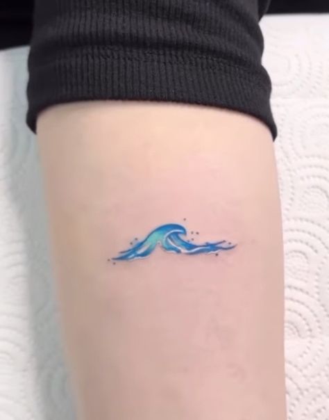 Wave Colored Tattoo, Watercolor Waves Tattoo, Watercolour Wave Tattoo, Blue Wave Tattoo, Watercolor Wave Tattoo, Ocean Wave Tattoo, Simple Wave Tattoo, Beachy Tattoos, Wrist Band Tattoo