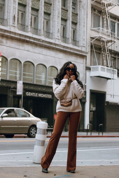 Oversized Knits and Flares | A Fall Uniform Brown Flares Outfit, Brown Flare Pants Outfit, Knit Pants Outfit, Cable Knit Sweater Outfit, Flare Outfit, Brown Flare Pants, Brown Pants Outfit, Brown Cable Knit Sweater, Green Pleated Skirt