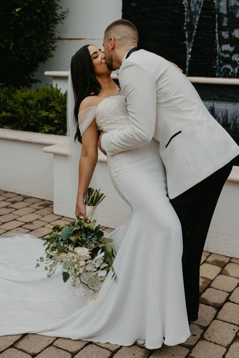 bride and groom kissing outside Gramercy at Lakeside Manor Black And White Color Palette, Bride And Groom Kissing, White Color Palette, Black Tie Optional, Authentic Wedding, Real Weddings Photos, Stunning Wedding Dresses, Nj Wedding, Classy Wedding