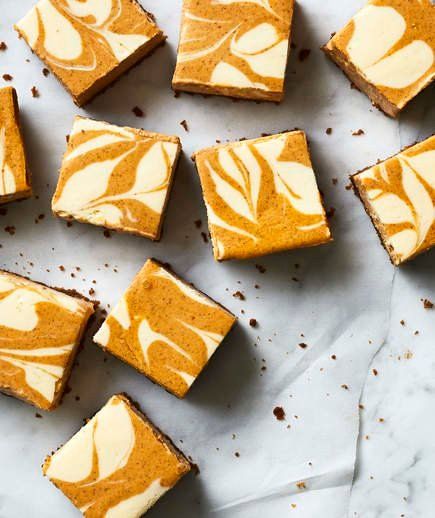 Pumpkin Swirl Cheesecake Bars | These gorgeous bars are much easier to prepare than a whole cheesecake—but just as tasty. For starters, they have a speculoos cookie crust (what cookie butter is made from), which pairs deliciously with the spiced pumpkin filling. If you have gingersnaps or graham crackers laying around, feel free to sub those in instead. Original Cheesecake, Pumpkin Spice Recipes, Cheesecake Mixture, Pumpkin Swirl Cheesecake, Pumpkin Filling, Pumpkin Spice Bread, Swirl Cheesecake, Hey Pumpkin, Pumpkin Spice Recipe