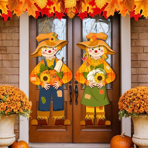 PRICES MAY VARY. Fall Scarecrow Decoration: you will receive 2 fall scarecrow wall plaques, designed as boy and girl figures, they are holding pumpkins, sunflowers and etc., to add fall fun for you and your family, friends, or neighbors Quality and Reliable Material: our fall front door hanging signs are made of quality wood material, sturdy and reliable, nice texture, with bright colors, not easy to crack or fade, can be applied for multiple holidays Appropriate Size: fall hanging fun scarecrow Front Porch Decor Fall Simple, Outside Fall Party, Diy Scarecrow Decoration, Door Decorations Fall, Thanksgiving Door Sign, Thanksgiving Door Decorations, Scarecrow Decor, Scarecrow Decorations, Home Front Porch